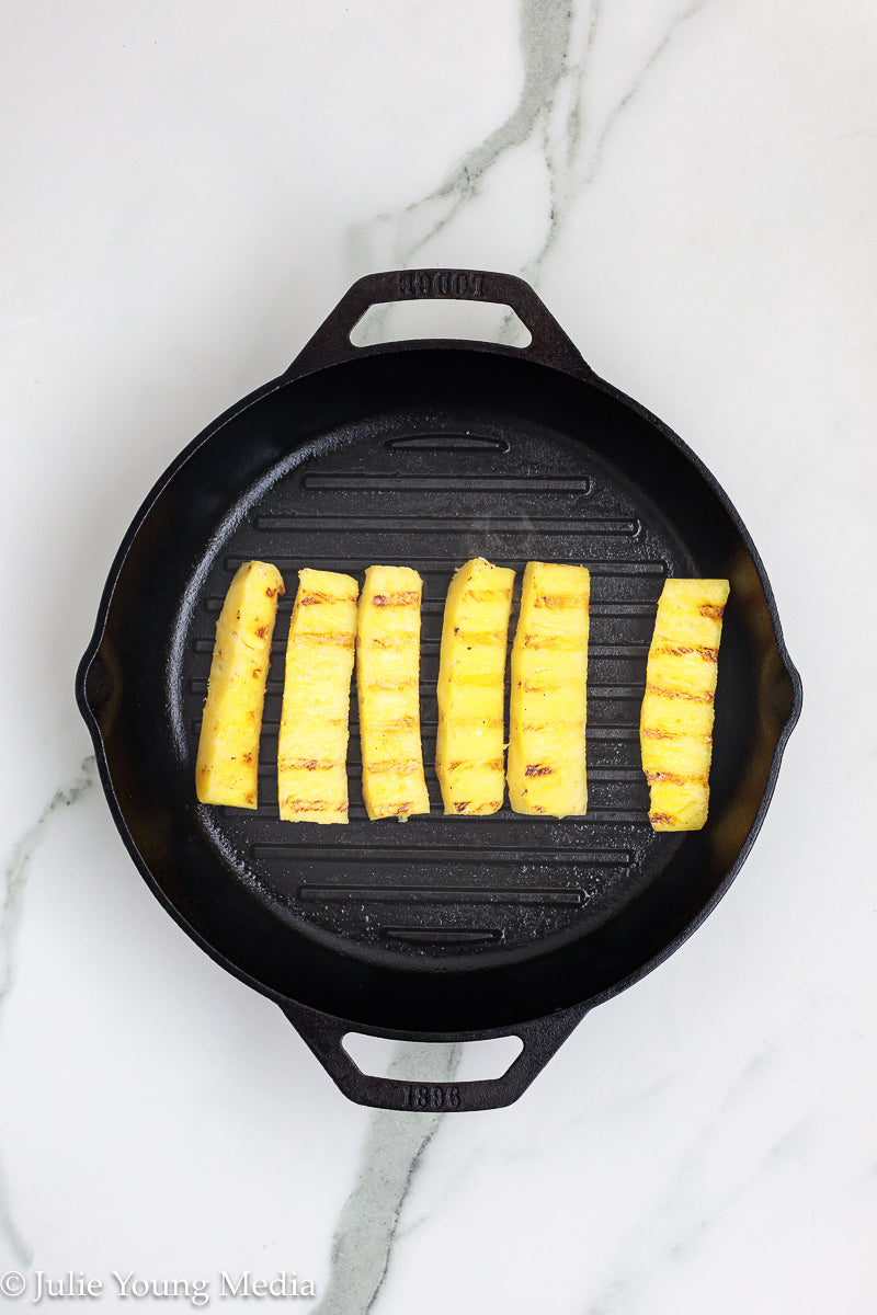 Pina Colada Bread Pudding + Coconut Rum Butter Sauce + Grilled Pineapple Spears