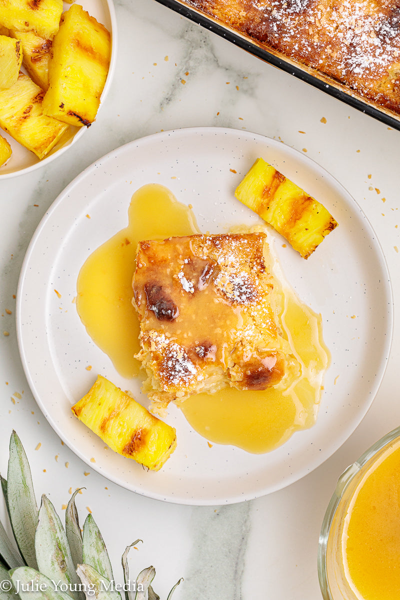 Pina Colada Bread Pudding + Coconut Rum Butter Sauce + Grilled Pineapple Spears