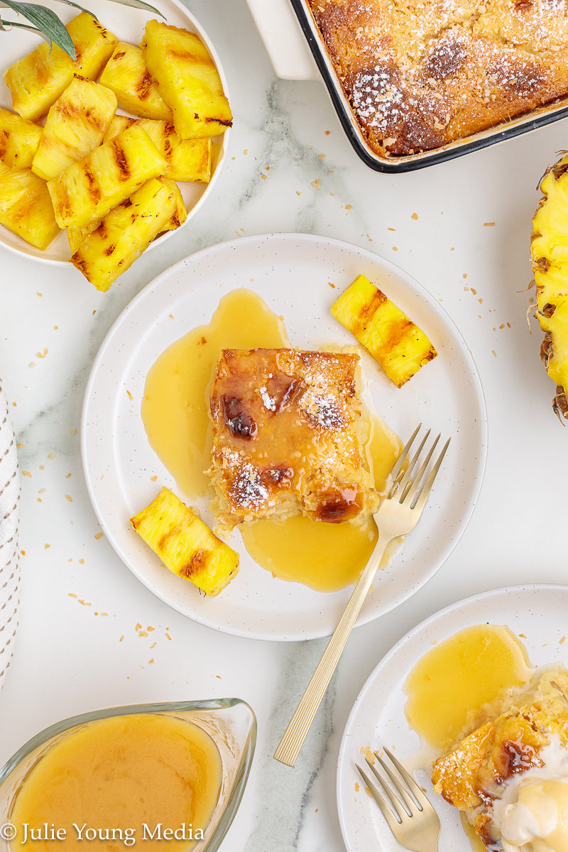 Pina Colada Bread Pudding + Coconut Rum Butter Sauce + Grilled Pineapple Spears