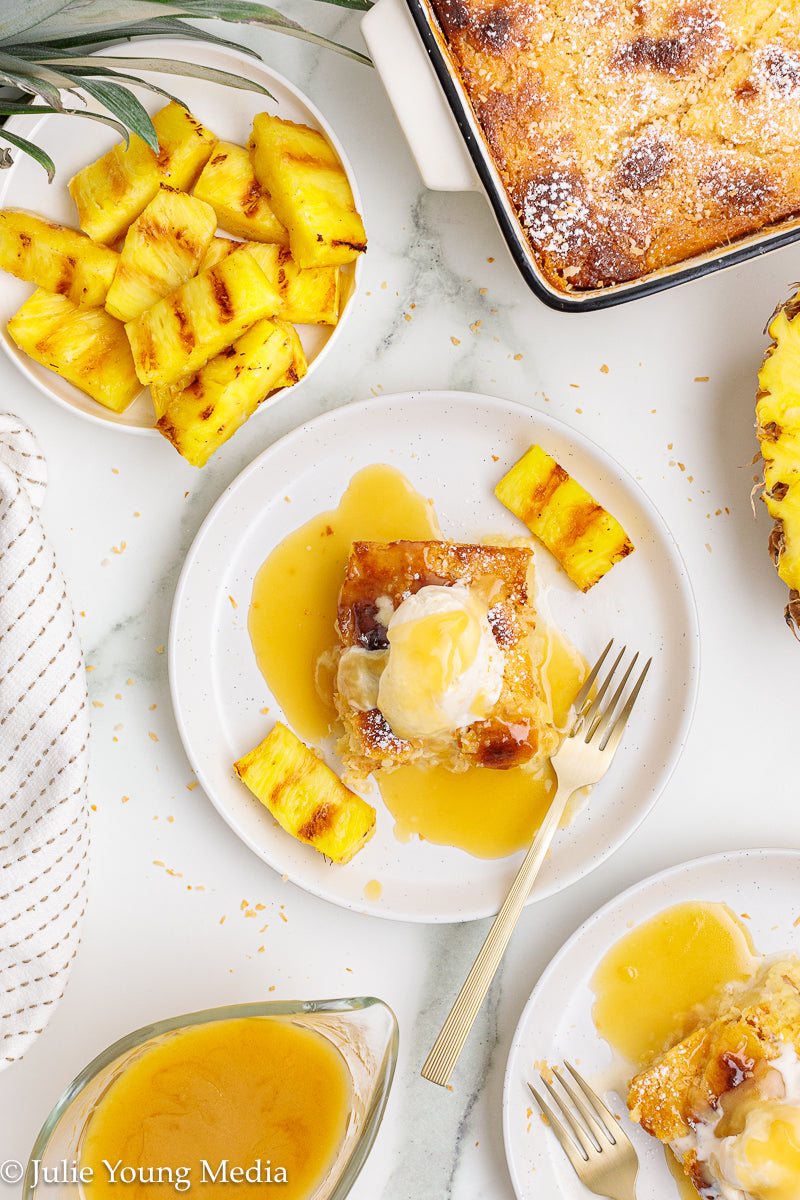 Pina Colada Bread Pudding + Coconut Rum Butter Sauce + Grilled Pineapple Spears