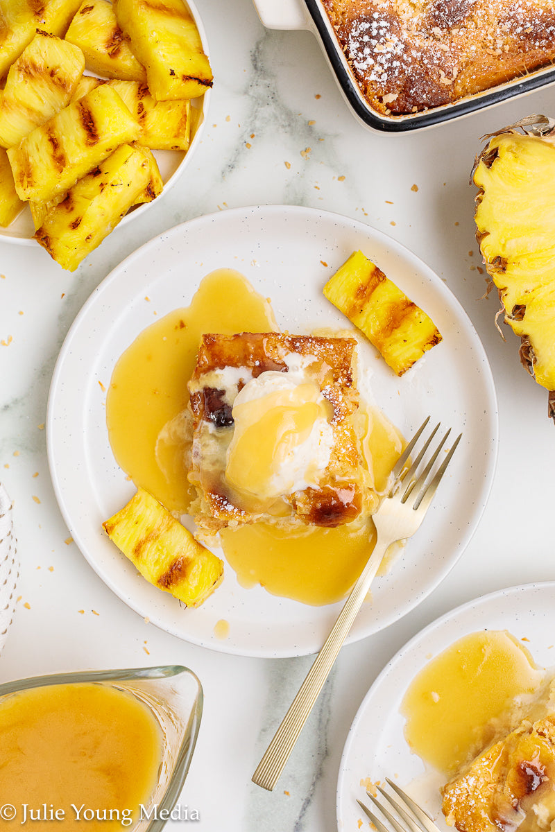 Pina Colada Bread Pudding + Coconut Rum Butter Sauce + Grilled Pineapple Spears