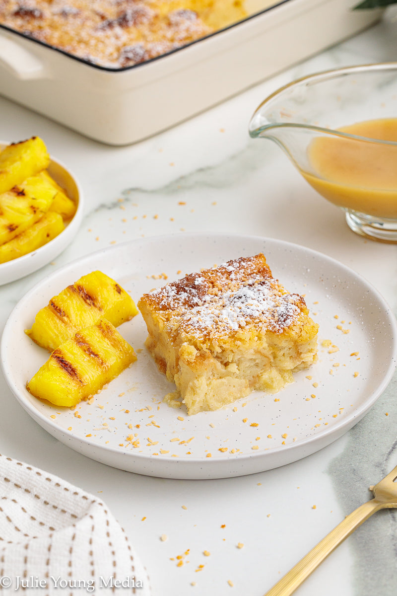 Pina Colada Bread Pudding + Coconut Rum Butter Sauce + Grilled Pineapple Spears