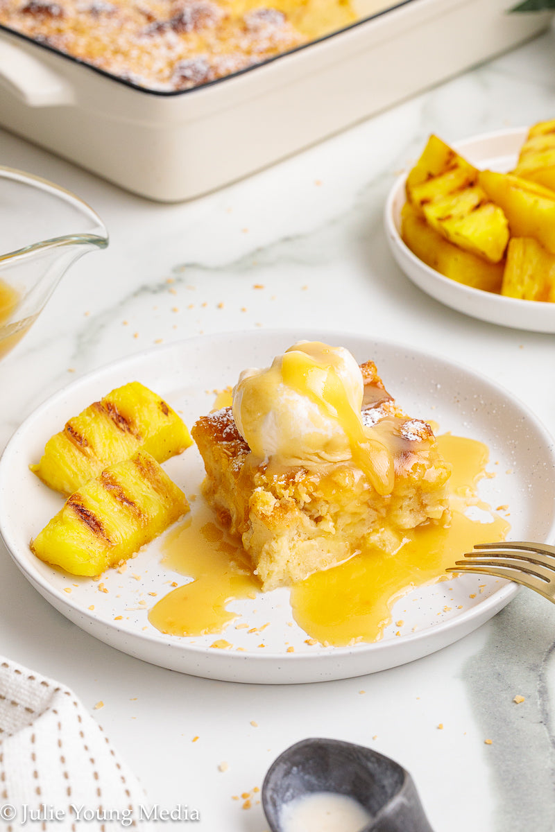 Pina Colada Bread Pudding + Coconut Rum Butter Sauce + Grilled Pineapple Spears