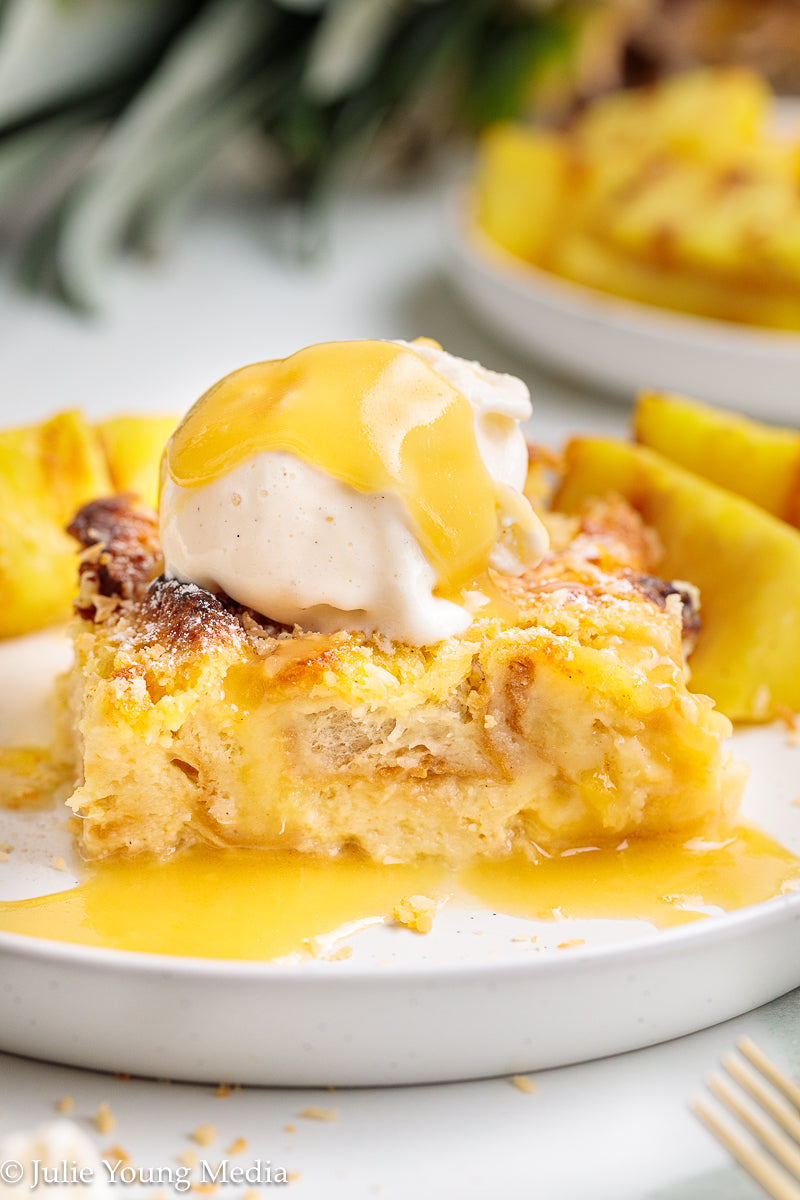 Pina Colada Bread Pudding + Coconut Rum Butter Sauce + Grilled Pineapple Spears