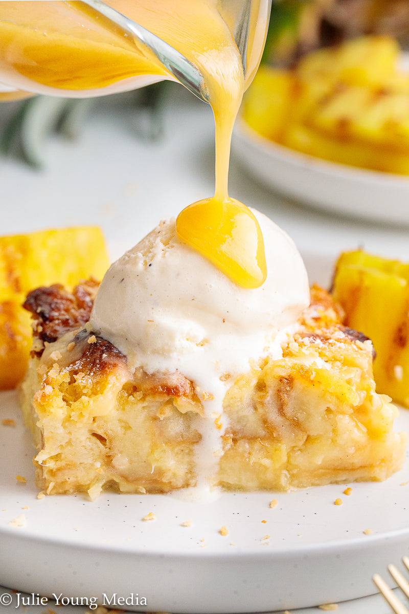 Pina Colada Bread Pudding + Coconut Rum Butter Sauce + Grilled Pineapple Spears