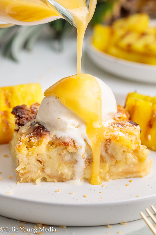 Pina Colada Bread Pudding + Coconut Rum Butter Sauce + Grilled Pineapple Spears